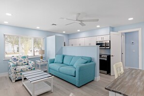 Caloosa features a large living room with queen sleeper sofa and full kitchen