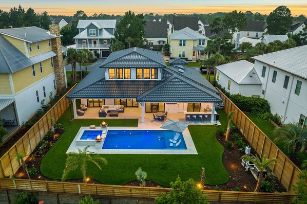Large private backyard with *heated pool and *hot tub