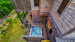 Fairy lights adorn the private hot tub deck