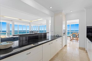 The modern kitchen comes fully equipped to prepare meals at home, but you’ll also find plenty of eateries close by.
