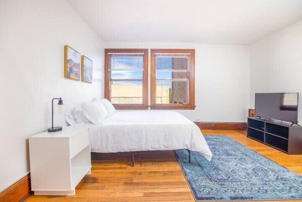 Cozy queen bed with Smart TV