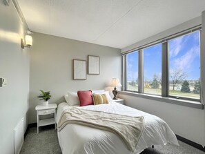 Queen plush bed awaits - amazing view here as well