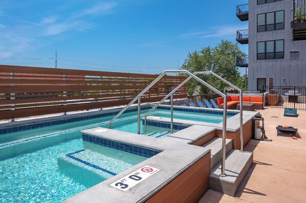 Hot tubs include steps and safety rails for easy access, as well as insulated covers to maintain heat and conserve energy.
