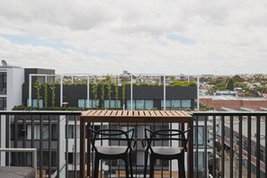 A high top table seats two, offering sweeping views to enjoy over your morning coffee.