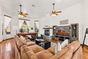 Living Room: Experience style and fun with pool games and relaxing vibes! 