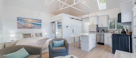 Compact living, big comfort. Modern studio w/ full kitchen.