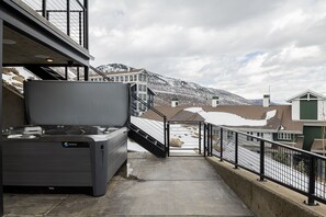 1st level deck with a 6-seat hot tub