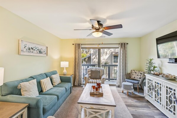 Discover this charming, recently renovated two-level villa nestled in Hilton Head's lively Forest Beach area—often called the island's downtown.
