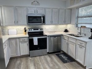 Freshly renovated, fully equipped kitchen with all new dishes & pots & pans.