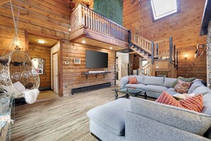 Open concept living room makes up the primary space in the home.