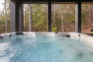 Hot tub with lake views.