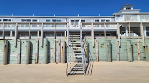 Steps leading up for the water and beach to the association property