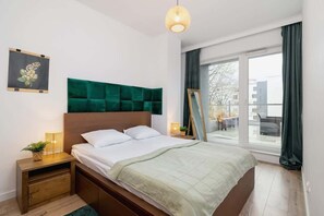 Bedroom with an exit to the balcony