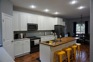 Kitchen with large walk in pantry