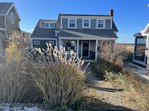 Entrance to the house with the beach in the distance.