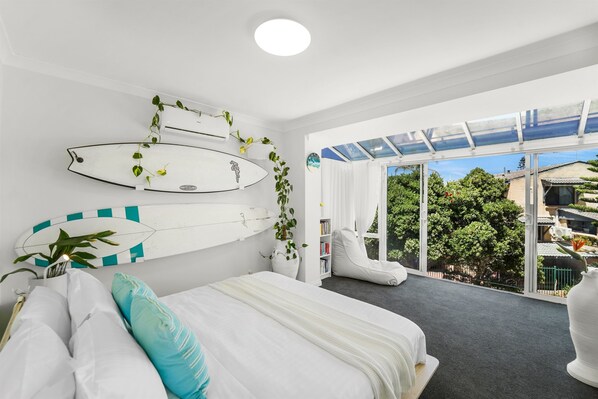 Master Bedroom:King Bed, floor to ceiling window with ocean views
