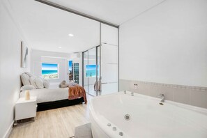 Master Bedroom : King Bed with spa bath