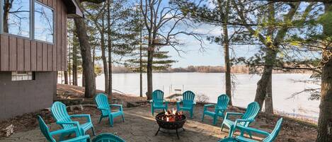Enjoy the outdoor campfire with picturesque views overlooking the lake.