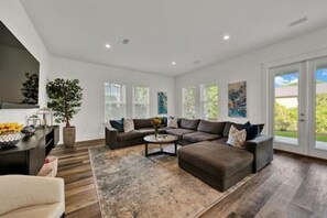 Huge living room with 65" Smart TV