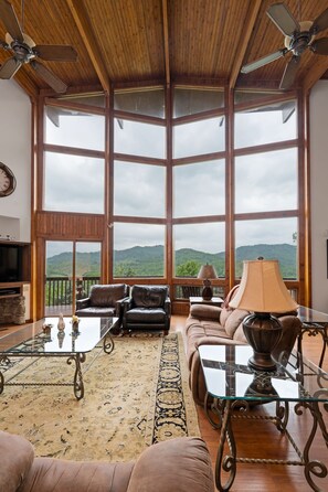 Enjoy priceless views right from the livingroom through the wall to ceiling windows.