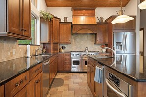 Chefs dream! Large gourmet kitchen that includes a Viking stove/oven