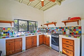 Big kitchen with traditional tiling