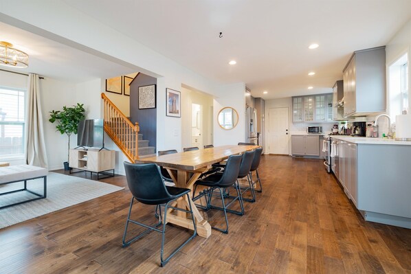 Walk into the large dining area which connects the living room and kitchen.