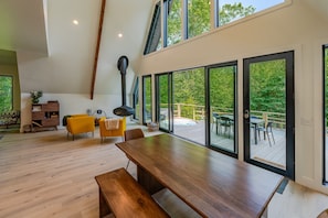 Living Area w/ Hanging Woodburning Fireplace