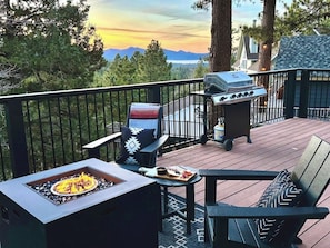 Relax by the fire pit in the brand new comfortable Adirondack style chairs as you take in both the ski slope and lake views.