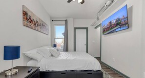 Bedroom #2 Queen bed, with 50 inch smart TV, private bathroom and blackout curtains 

 (Here for work/education? Send a message for a potential discount.)