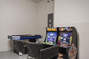 Game room fun! Enjoy arcade classics and air hockey battles