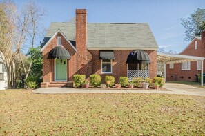 Step back in time in this vintage-inspired brick home. With modern comforts and classic charm, it's the ideal place to unwind.