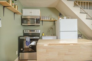 With a fully equipped kitchen, cozy seating area, and a separate dining space, it's the perfect place to relax and entertain.