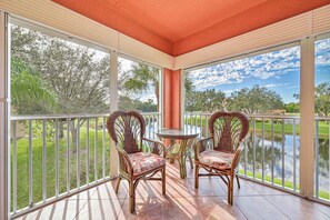 BF201 - Sliding doors open up to the oversized balcony with lake and golf course view