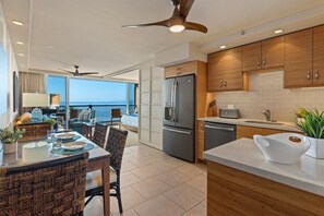 With large sliding doors the view extends to the entry way of the condo