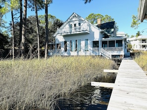 Home and dock you can Paddleboard or Kayak from. The Gulf and beach are close!