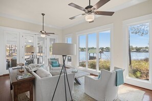 Living Room between two porches with views!