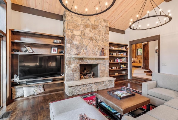 Living space to accommodate the family movie night after a long day on the mountain.