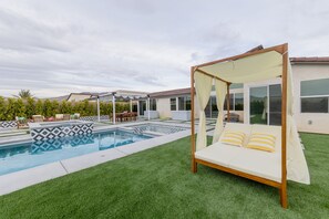 Lounge cabana with removable fabric to get the perfect amount of sun. 