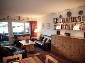 Brown, Picture Frame, Property, Couch, Table, Lighting, Interior Design, Studio Couch, Wood, Living Room