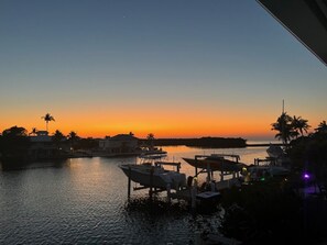 Sunset over the neighbors boats