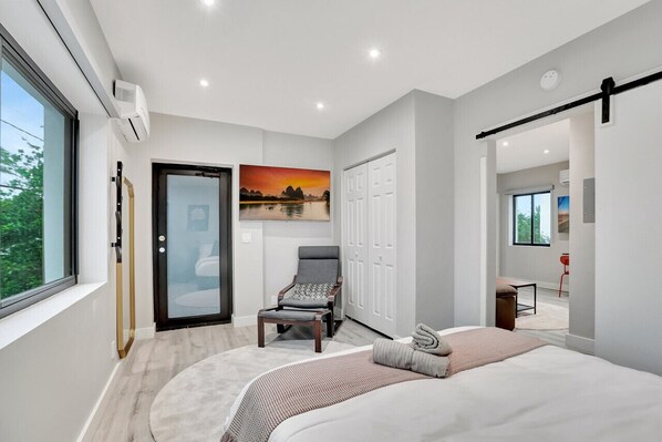 Soft colors and personal touches create a haven for relaxation.