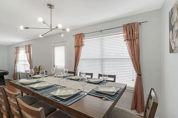 Gather 'round in style! Our 8-seater dining area sets the stage for memorable feasts and cherished moments. ļøāØ