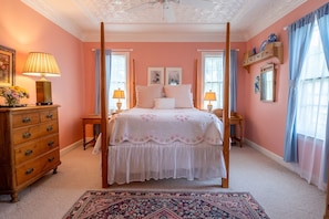View of the "Pink Bedroom" entering through French doors from the living room.
