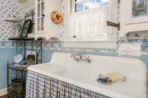 Large oversized antique kitchen sink.
