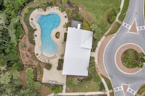 The community pool is just a short distance from the house. 