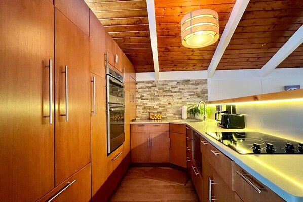 Whip up a delicious meal in our fully-equipped kitchen with LED light