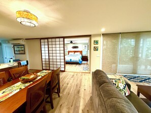 View from living/dining room into the primary bedroom.
