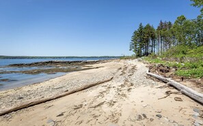 Private beach standing near house looking north.
