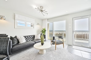 "Stunning ocean views from main floor living room and patio."